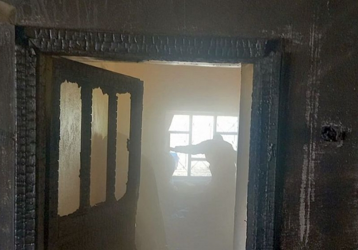 Yanan Evde Mahsur Kalan Çocuğu Mahalleli Kurtardı